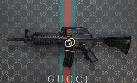 gucci ad woman with tattoo|Gucci guns for sale.